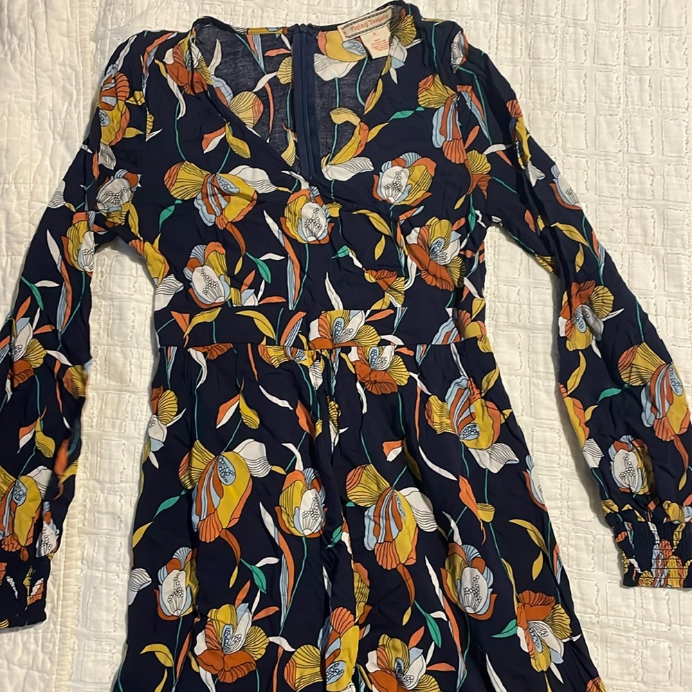 Beautiful long sleeve dress with high-low detail on bottom.